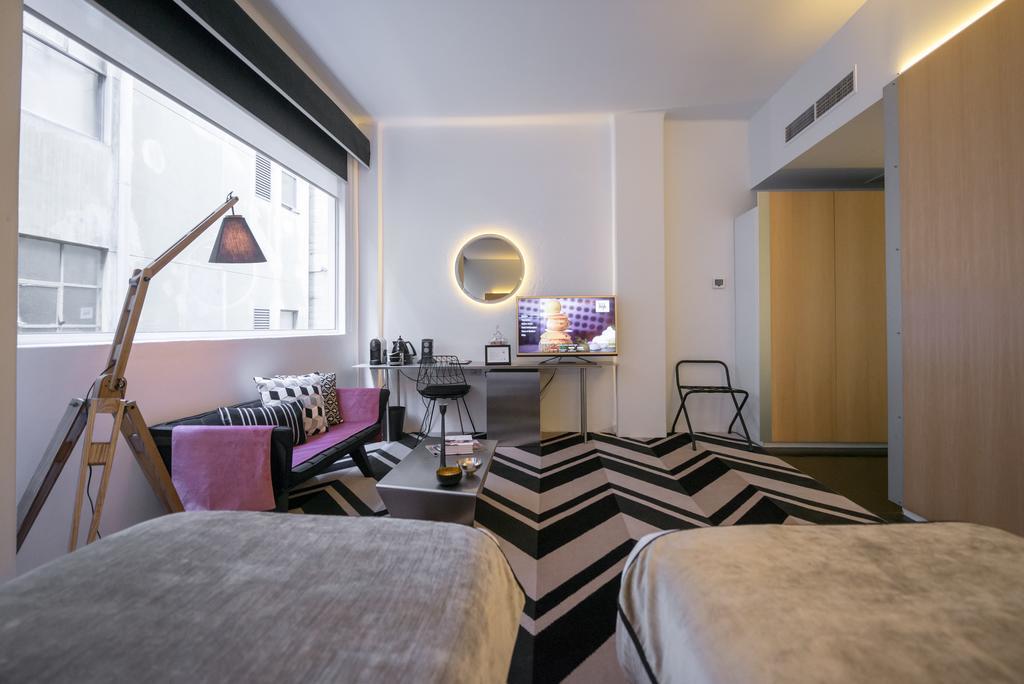 Adelphi Hotel Melbourne Quarto foto A room at the hotel